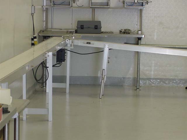 Industrial application in a bakery. Note the right angle transition and the change in height.